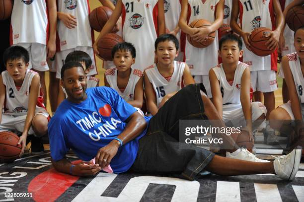 American professional basketball player Tracy McGrady of the Detroit Pistons during his meeting with fans on August 28, 2011 in Foshan, Guangdong...