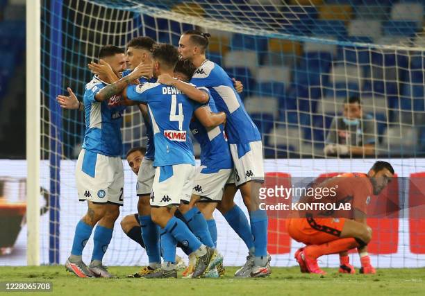 Napoli's Italian striker Matteo Politano celebrates with teammates after scoring a goal with team during the Serie A football match SSC Napoli vs SS...