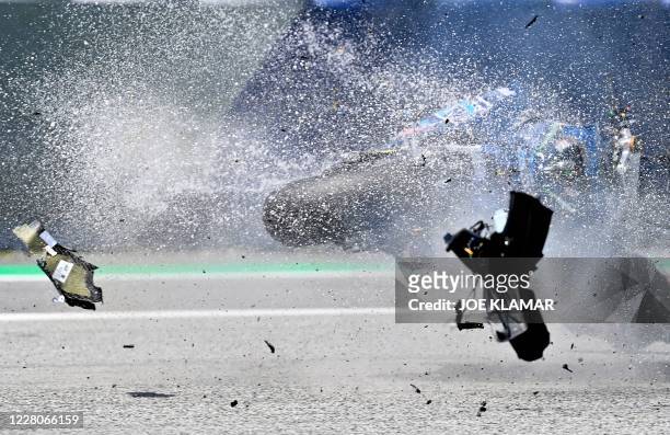 Bike of Italtrans Racing Team Italian rider Enea Bastianini is hit by another bike during a crash during the Moto2 Austrian Grand Prix at Red Bull...