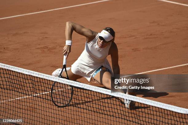 Lucie Hradecka of Czech Republic competes in the Women's Doubles Final against Monica Niculescu and Raluca Olaru of Romania during the WTA Prague...