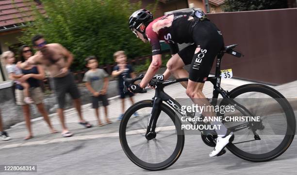 Team Ineos rider Russia's Pavel Sivakov rides after crashed during the fifth stage of the 72nd edition of the Criterium du Dauphine cycling race, 153...