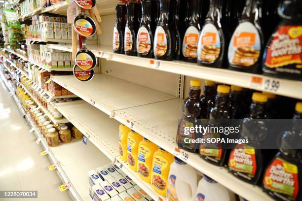 Empty supermarket shelves space originally occupied by Aunt Jemima products. The company is going to give its 130 year old Aunt Jemima brand a new...