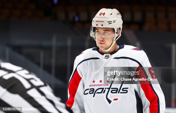 Brian Pinho of the Washington Capitals gets ready for a face-off against the New York Islanders during the third period in Game Three of the Eastern...
