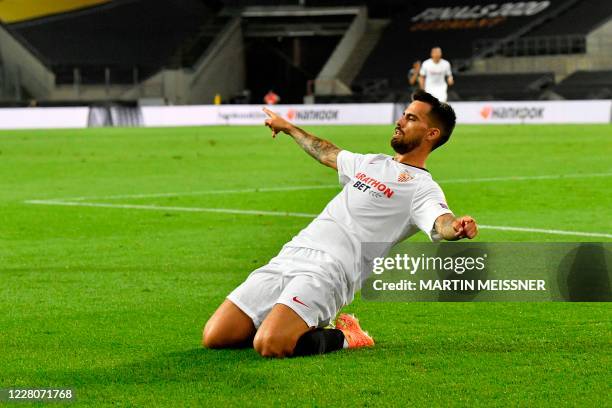 Sevilla's Spanish midfielder Suso celebrates scoring during the UEFA Europa League semi-final football match Sevilla v Manchester United on August...