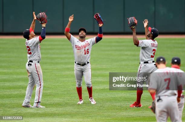Juan Soto, Victor Robles and Michael A. Taylor of the Washington Nationals celebrate after a 6-5 victory against the Baltimore Orioles at Oriole Park...