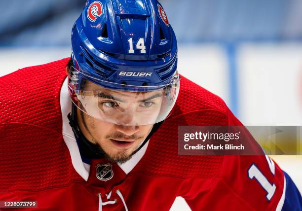 Nick Suzuki of the Montreal Canadiens gets ready to take a face-off against the Philadelphia Flyers during the first period in Game Three of the...