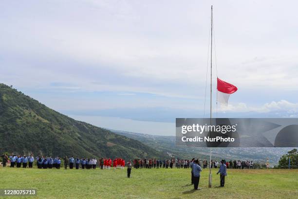 The flag ceremony to commemorate Indonesia's 75th independence was carried out by a group of people from government institutions and community...