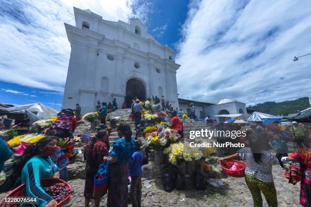 Hundreds of Guatemalans in the church and market do not use their masks properly and social distancing in Chichicastenango 150 kilometers west of...