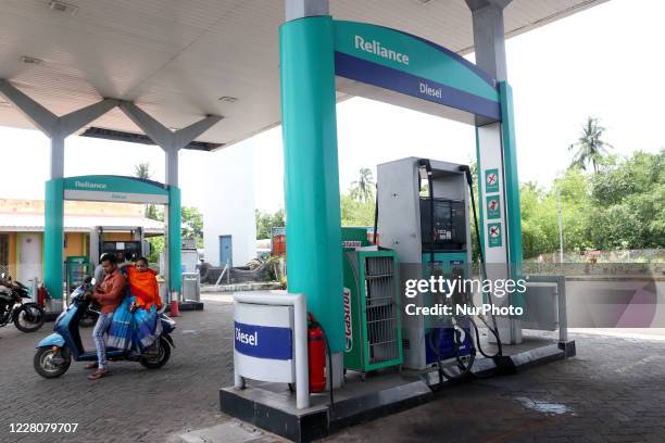 The seen A Relince Petorl Pump ,Of the 1,394 petrol pumps that Reliance operates, 518 are company owned and the remaining dealer operated,RIL...