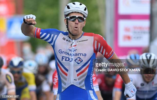 French Arnaud Demare of Groupama-FDJ celebrates as he crosses the finish line to win during the second stage of the Tour De Wallonie cycling race, 1...