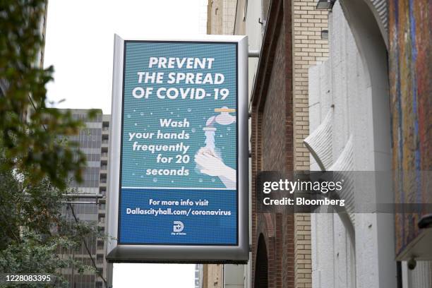 Digital billboard to help prevent the spread of Covid-19 in downtown Dallas, Texas, U.S., on Monday, Aug. 17, 2020. Texas officials have launched an...