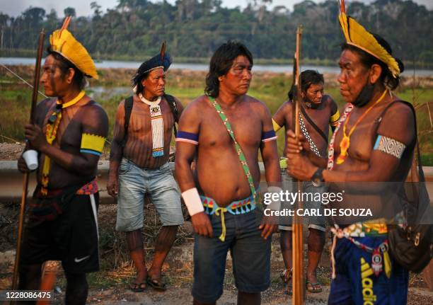 Members of the Kayapo tribe stand at the BR163 highway during a protest in the outskirts of Novo Progresso in Para State, Brazil, on August 17, 2020...