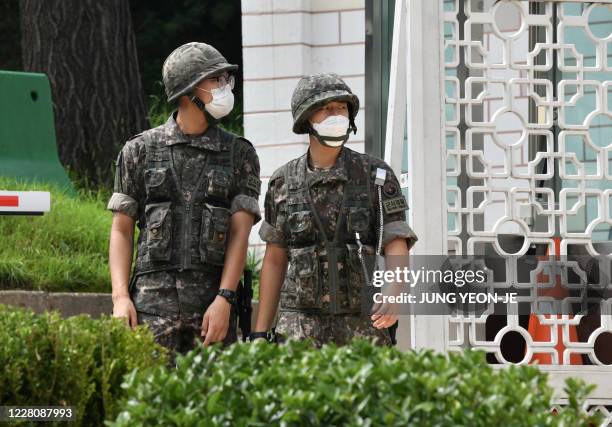 South Korean soldiers stand guard at the main gate of the Defence Ministry in Seoul on August 18, 2020. - South Korea and the United States began...