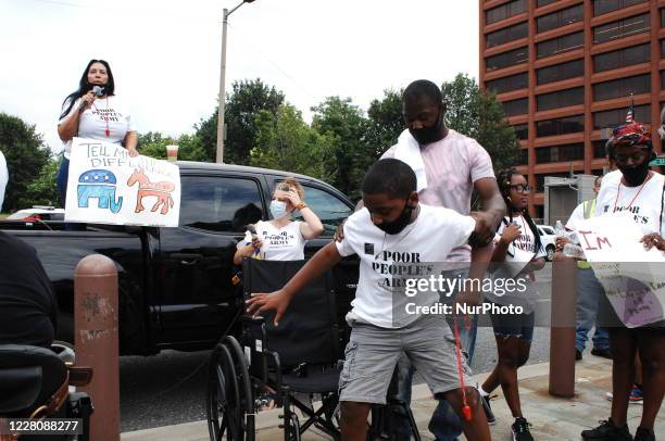 Protesters Rally at Independence Mall to demand an end to gun violence and that both political parties prioritize the lives of poor Americans over...