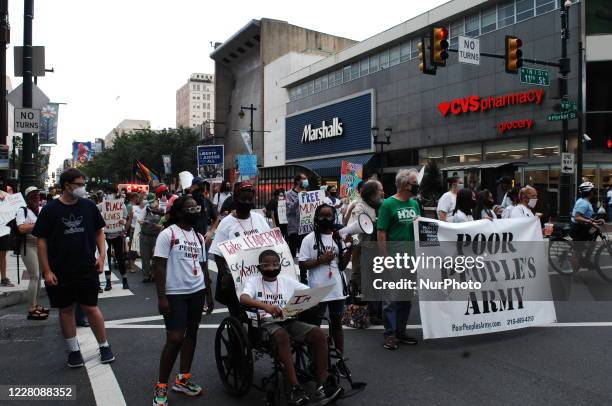 Protesters March through downtown from Independence Mall to the Biden/Harris Headquarters to demand both parties prioritize the needs of poor...