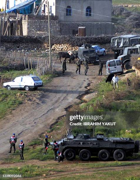 General view taken on May 5, 2009 shows police at the entrance of the Turkish village of Bilge outside the southeastern Kurdish city of Mardin after...