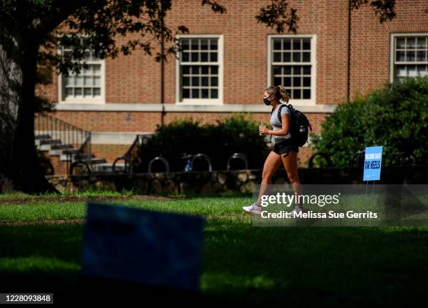 Student walks through the campus of the University of North Carolina at Chapel Hill on August 18, 2020 in Chapel Hill, North Carolina. The school...