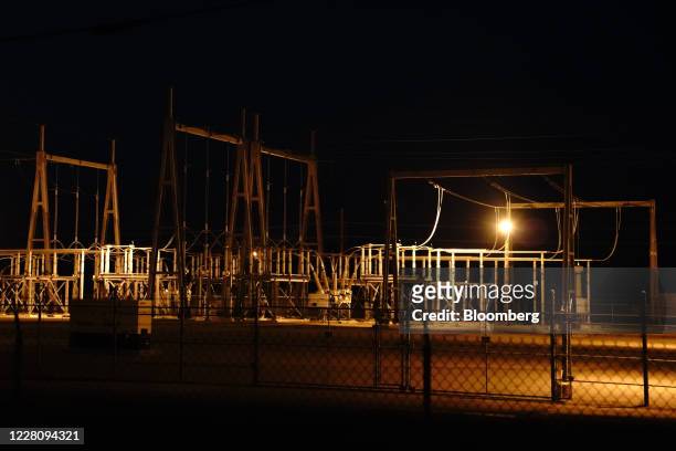 Power substation at the Tenaska Imperial Solar Energy Center South facility at night in El Centro, Imperial County, California, U.S., on Tuesday,...