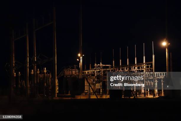 Power substation at the Tenaska Imperial Solar Energy Center South facility at night in El Centro, Imperial County, California, U.S., on Tuesday,...