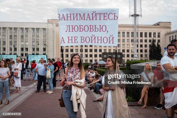 Make Love, Not War" Demonstrators participate in an anti-Lukashenko rally on August 18, 2020 in Minsk, Belarus. There have been near daily...