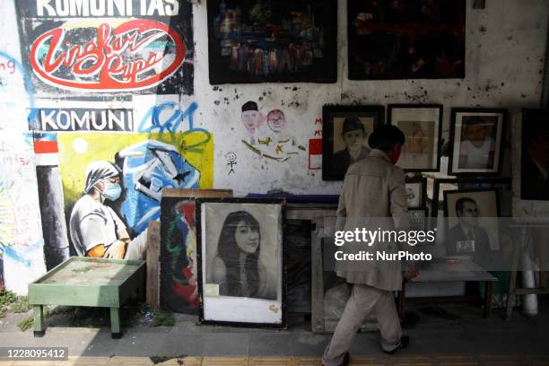 Bambang, prepare to opens his street paint studio during the celebration of Indonesia's 75th Independence Day in Jakarta, Indonesia on August 17,...