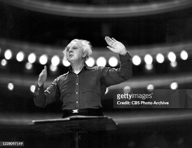 Maestro Leopold Stokowski conducts a rehearsal of the New York Philharmonic Symphony Orchestra on March 23 in New York, New York.