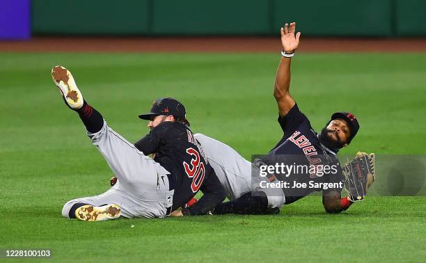 Tyler Naquin and Delino DeShields of the Cleveland Indians collide during the fourth inning against the Pittsburgh Pirates at PNC Park on August 18,...