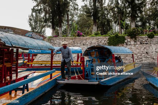 August 2020, Mexico, Mexiko-Stadt: The Trajineras of Xochimilco, after being closed for five months due to the pandemic, will reopen for tourists...