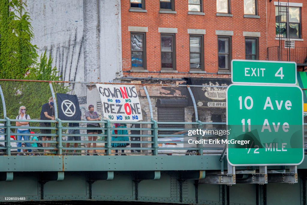 Protesters holding a No Gowanus Rezoning banner at the...