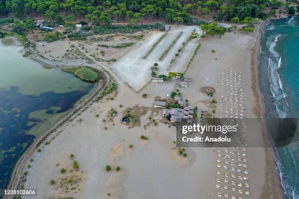 Drone photo shows Iztuzu beach which has many caretta caretta nests in Mugla, Turkey on August 17, 2020. Wounded sea turtles are treated at the Sea...