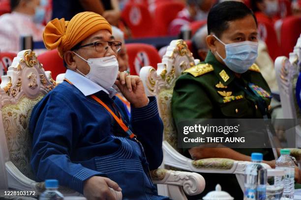 Chairman of the Restoration Council of Shan State Yawd Serk and Myanmar's Military Vice Senior General Soe Win attend the opening ceremony of the 4th...