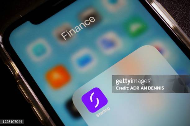 Photograph arranged as an illustration in Hartley Wintney, west of London on August 19, 2020 shows the icon for the Starling Bank banking app on a...