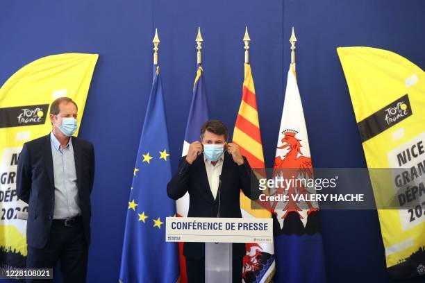 Mayor of Nice Christian Estrosi and Tour de France director Christian Prudhomme, wearing face masks, give a press conference to present sanitary...