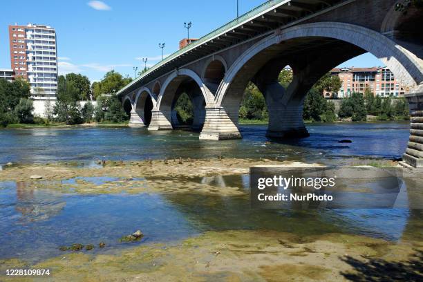 The Garonne river is near its record low levels due to a lack of rain since the beginning of 2020 and a scorching heat during several periods of peak...