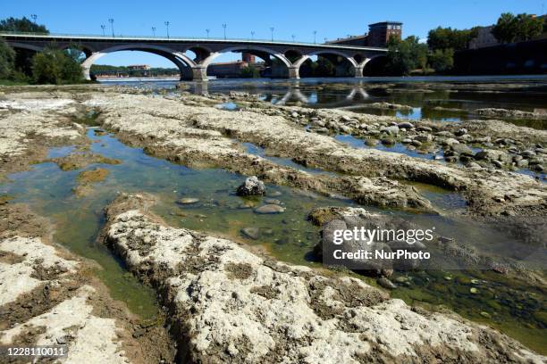 Garonne' river bed.The Garonne river is near its record low levels due to a lack of rain since the beginning of 2020 and a scorching heat during...