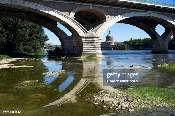 The La Grave monument is seen from the Garonne' banks. The Garonne river is near its record low levels due to a lack of rain since the beginning of...