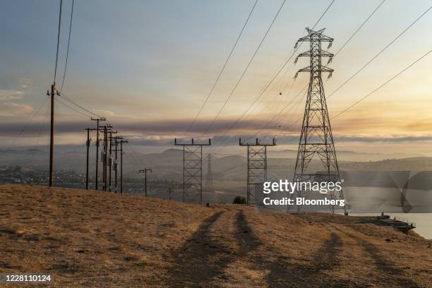 Power lines and transmission towers in Crockett, California, U.S., on Wednesday, Aug. 19, 2020. On Tuesday -- just as California was preparing to...