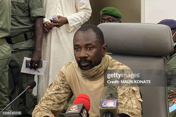 Colonel Assimi Goita speaks to the press at the Malian Ministry of Defence in Bamako, Mali, on August 19, 2020 after confirming his position as the...