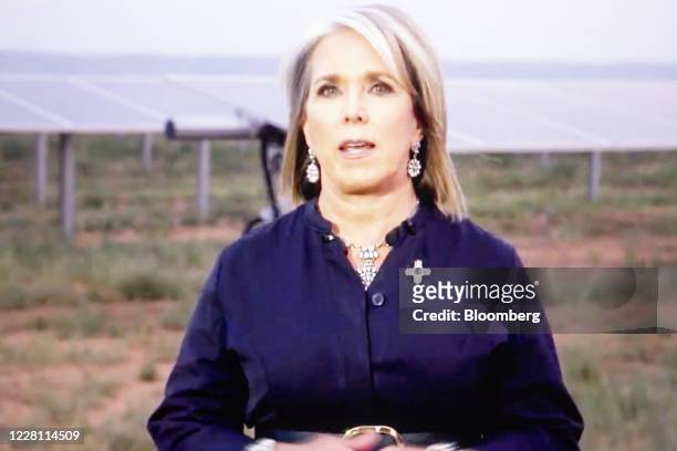 Michelle Lujan Grisham, governor of New Mexico, speaks during the virtual Democratic National Convention seen on a laptop computer in Tiskilwa,...