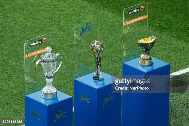 Russian Cup, Russian Premier League championship trophy and Russian SuperCup are seen during the Russian Premier League match between FC Zenit Saint...