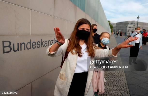 Swedish founder of the "School Strike for Climate" movement Greta Thunberg and German climate activist from the "Fridays for Future" movement Luisa...