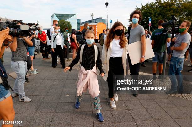 Swedish founder of the "School Strike for Climate" movement Greta Thunberg and German climate activist from the "Fridays for Future" movement Luisa...