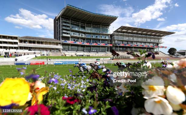 Montatham ridden by Jim Crowley wins the Clipper Logistics Handicap during day two of the Yorkshire Ebor Festival at York Racecourse on August 20,...