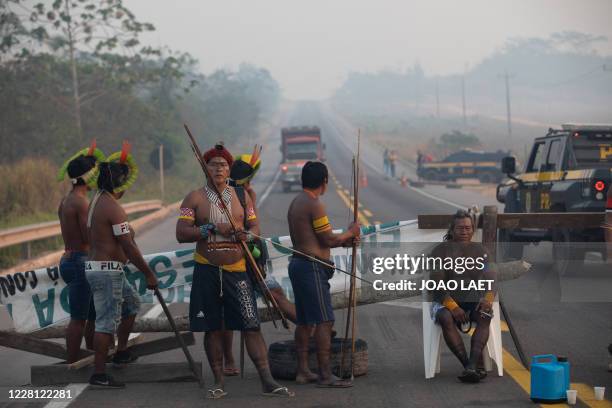 Members of the Kayapo indigenous group block highway BR163 during a protest in the outskirts of Novo Progresso in Para State, Brazil, on August 20,...