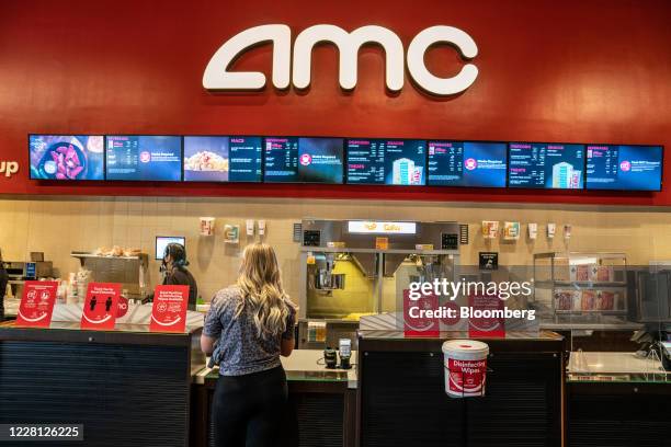 Customer visits the concession stand at an AMC Entertainment Holdings Inc. Movie theater in Austin, Texas, U.S., on Thursday, Aug. 20, 2020. AMC will...