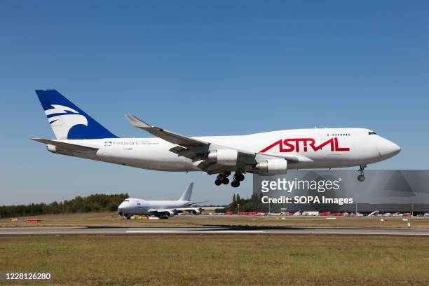 An Astral Aviation Boeing 747-400 BDSF about to touch the ground at Liege Bierset airport.