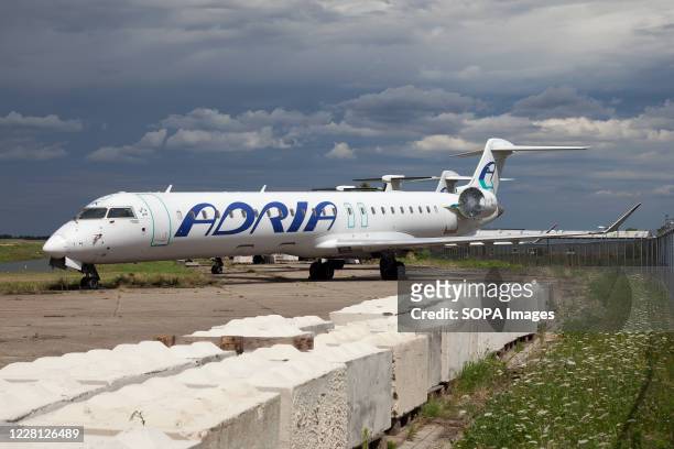 Bombardier CRJ 900 previously belonged to Adria Airways now stored at Maastricht-Aachen Airport.