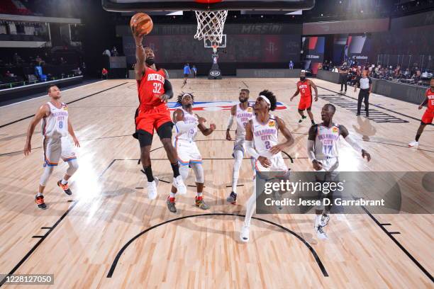 Orlando, FL Jeff Green of the Houston Rockets drives to the basket during the game against the Oklahoma City Thunder during Round One, Game Two of...