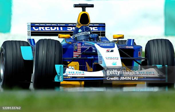 Heinz-Harald Frentzen of Germany takes his Sauber round a corner during the first practice session for the Malaysian Grand Prix in Sepang, 21 March...