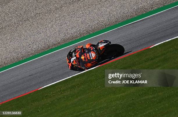 Red Bull KTM Factory Racing's Spanish rider Pol Espargaro rides his bike during the first training round of the Moto GP Styrian Grand Prix at the Red...